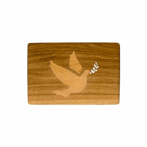 Holzbrettchen mit Friedenstaube